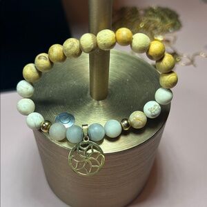 Elegant Beaded Bracelet with Gold Charm